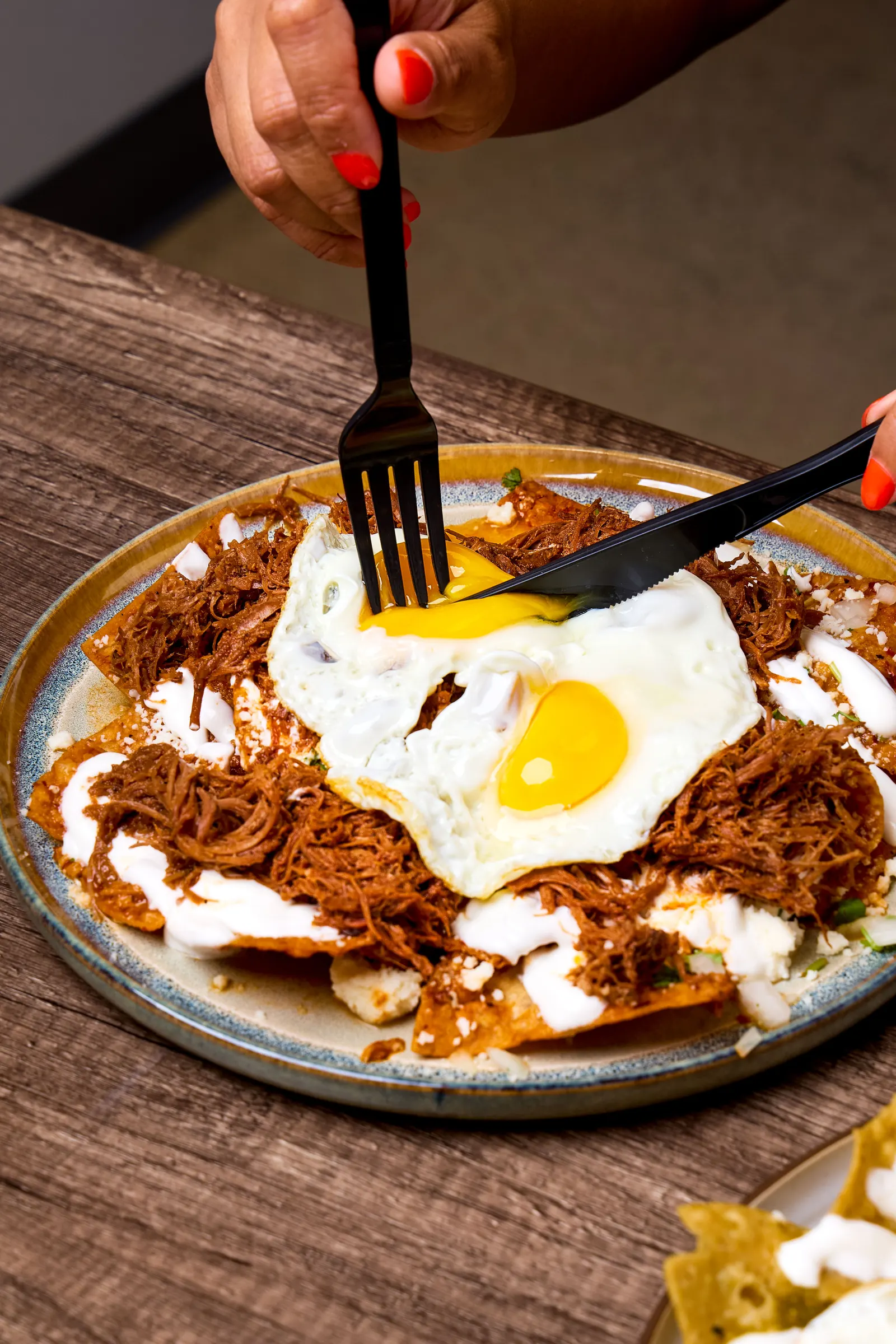 Chilaquiles rojos with eggs at Mr. Birria