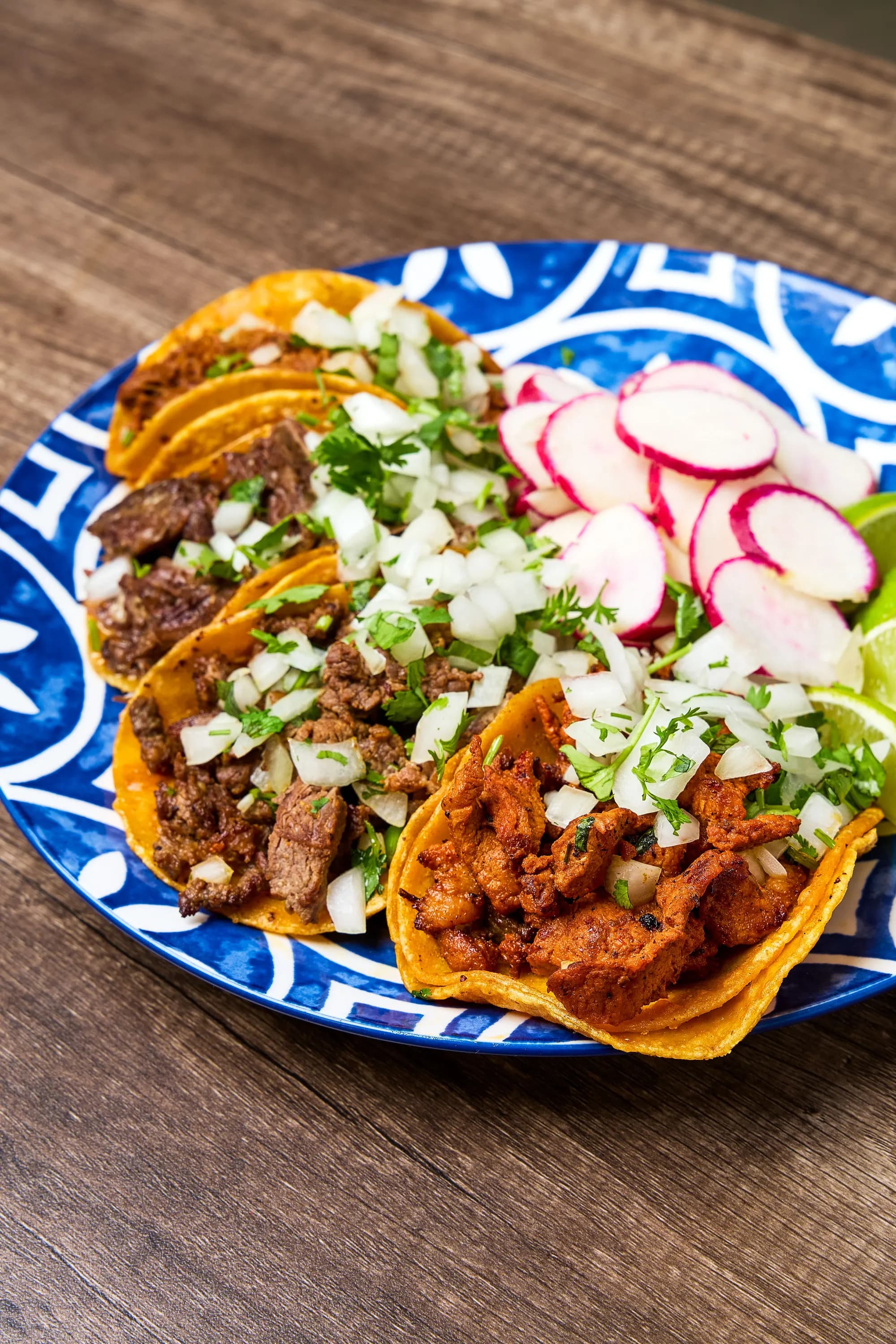 Taco box with four different meat tacos at Mr. Birria
